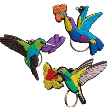 Porte-clés Colibris : 30 pièces - Piques incluses - Dimensions : Hauteur de 5,5 à 7 cm - Référence : 755 W - Matière : Silicone et métal - Couleur : Multicolore - Modèles aléatoires - Mondo Déco entreprise française