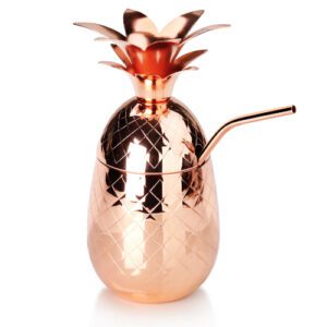 Descriptif du Cocktail ananas Cuivré  : Référence : 5792 1 pièce avec paille comprise Dimensions : H.10 cm Ø7,8 cm Contenance : 49,3 cl Matière : Acier inoxydable Couleur : Cuivre Incompatible lave-vaisselle